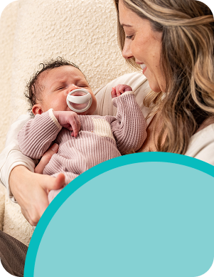 [Translate to Polish (Reborn) nuk.pl:] Mother with Baby and soother