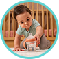 [Translate to Polish (Reborn) nuk.pl:] Baby with Learner Bottle