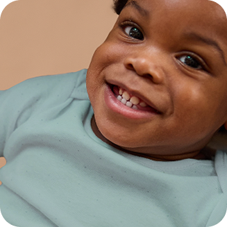 [Translate to Polish (Reborn) nuk.pl:] Baby smiling