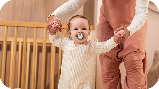 [Translate to Polish (Reborn) nuk.pl:] Baby with soother