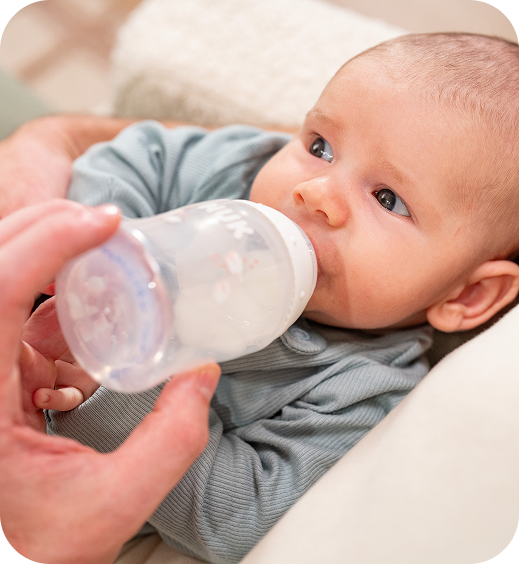 [Translate to Polish (Reborn) nuk.pl:] Mother with Baby and Baby bottle