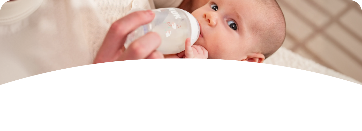 [Translate to Polish (Reborn) nuk.pl:] Baby with Babybottle