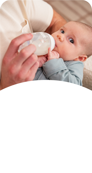 [Translate to Polish (Reborn) nuk.pl:] Baby with Babybottle