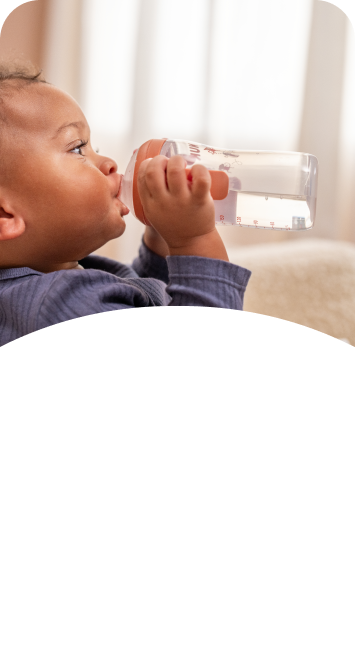 [Translate to Polish (Reborn) nuk.pl:] Baby with Learner bottle