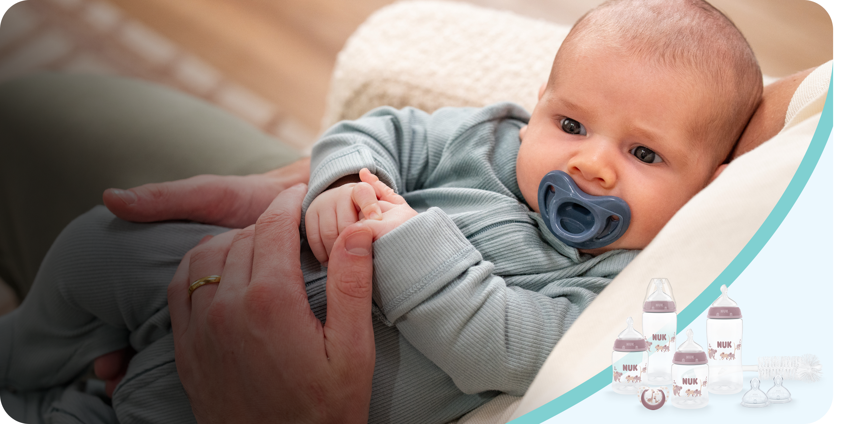 [Translate to Polish (Reborn) nuk.pl:] Baby with soother
