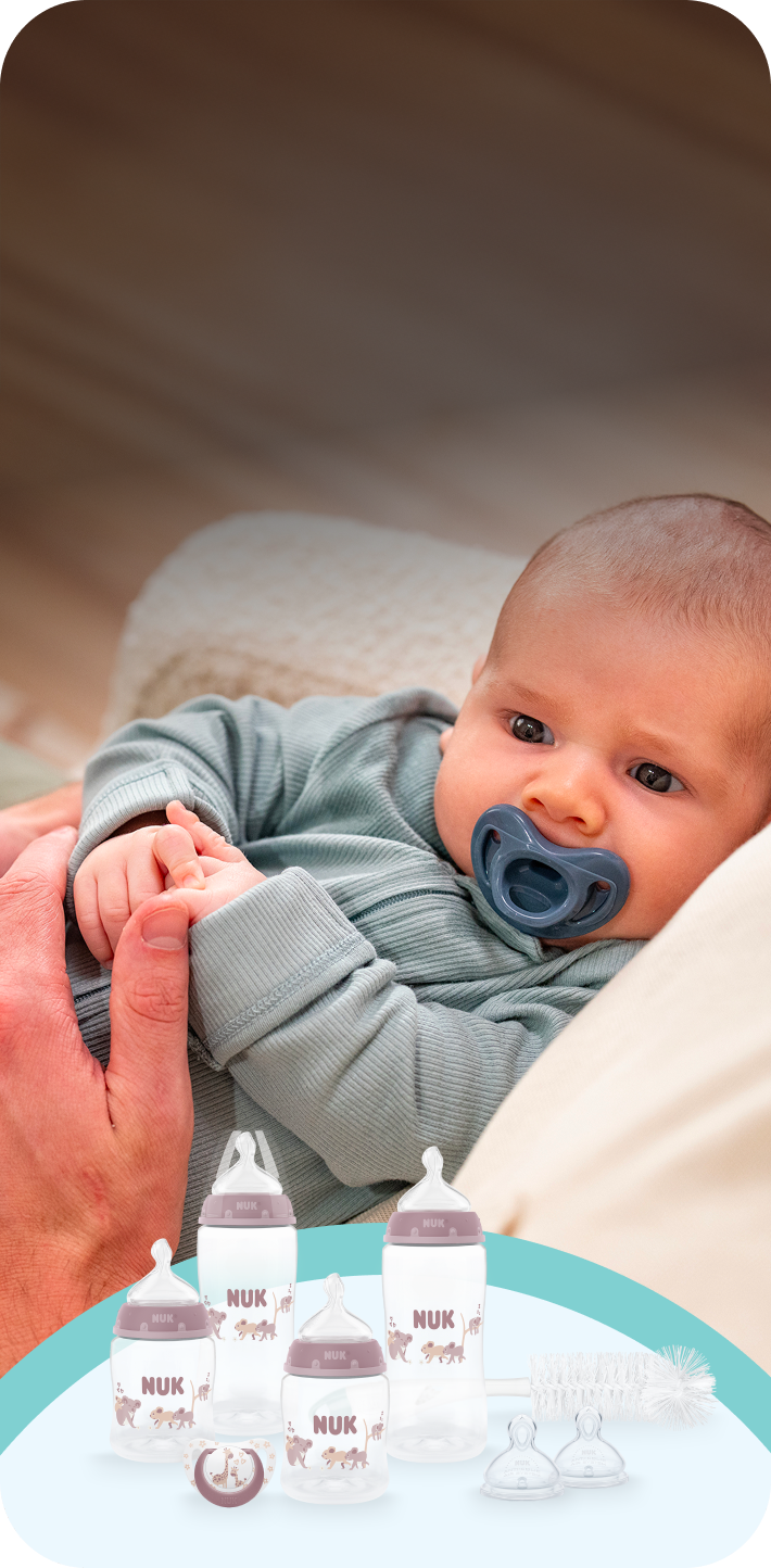 [Translate to Polish (Reborn) nuk.pl:] Baby with soother