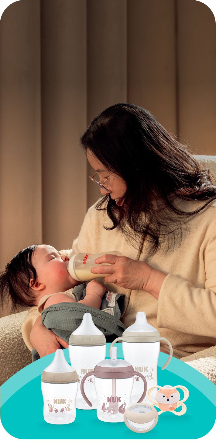 [Translate to Polish (Reborn) nuk.pl:] Mother with Baby and soother