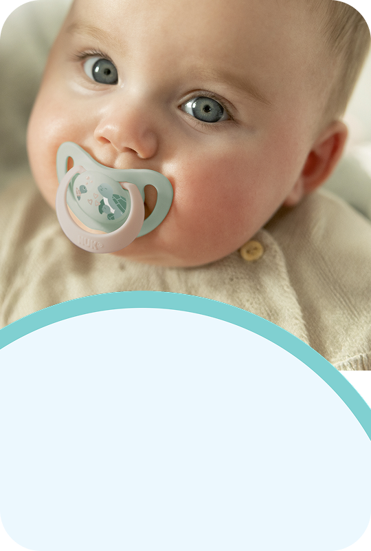 [Translate to Polish (Reborn) nuk.pl:] Baby with soother