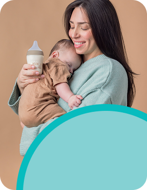 [Translate to Polish (Reborn):] Mother with Baby and Baby bottle