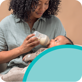 [Translate to Polish (Reborn) nuk.pl:] Mother with Baby and Babybottle