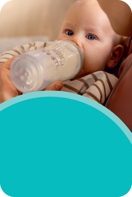[Translate to Polish (Reborn) nuk.pl:] Baby with Babybottle