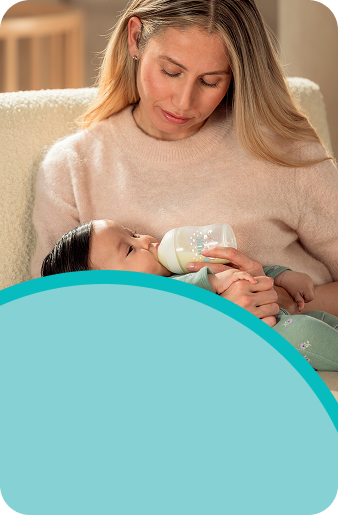 [Translate to Polish (Reborn) nuk.pl:] Mother with Baby and baby bottle