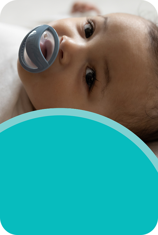 [Translate to Polish (Reborn) nuk.pl:] Baby with soother