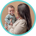 [Translate to Polish (Reborn) nuk.pl:] Mother with baby and soother