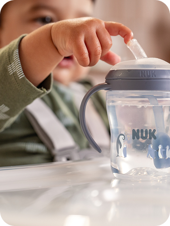 [Translate to Polish (Reborn) nuk.pl:] Baby with Learner Straw