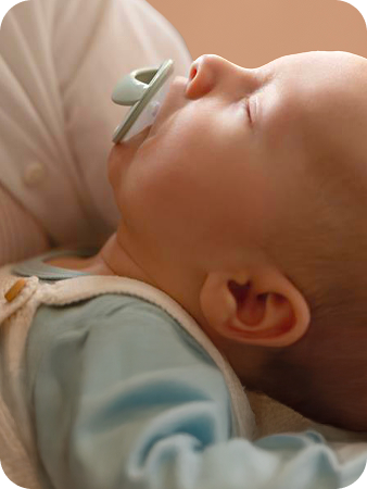 [Translate to Polish (Reborn) nuk.pl:] Baby with soother
